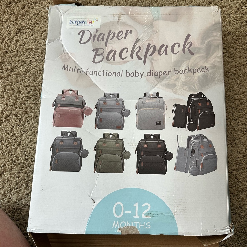 Gray Diaper Backpack with pull out changing station